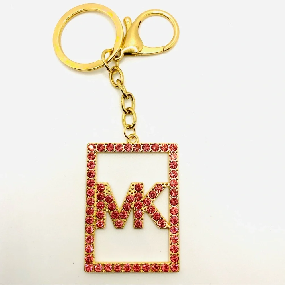 Purse Charm Key Chain MK Pink Crystals set in golden tone. BRAND NEW